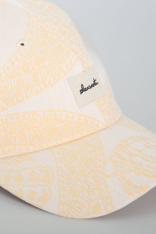 Cream pattern upcycled cap