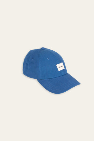 Ensfarvede kasketter