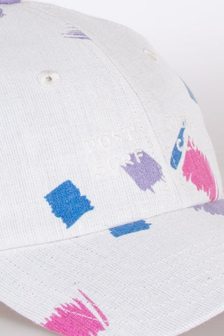 Artistic white upcycled cap