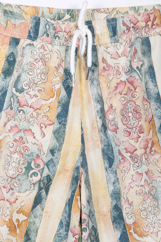 Artistic beige patterned upcycled shorts