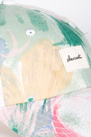 Playful green floral upcycled cap