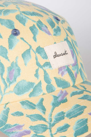 Faded yellow floral upcycled cap
