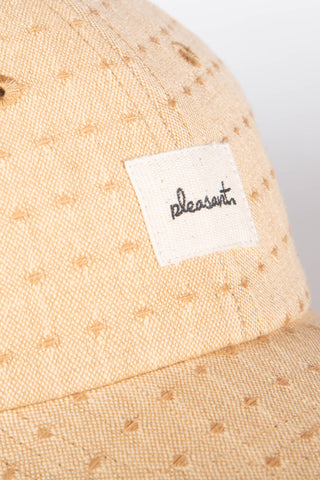 Sleek beige upcycled cap