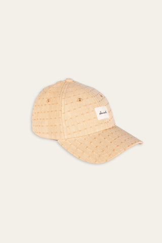 Sleek beige upcycled cap