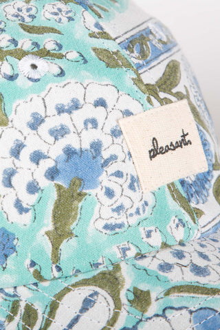 Refreshingly patterned turquoise upcycled cap